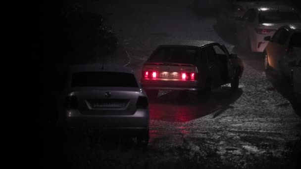 Man Quickly Leaves Old Soviet Car Summer Night Rain Parking — Stock video