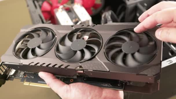 Caucasian Hands Spinning Fans Large Air Cooled Computer Graphic Card — Vídeo de Stock