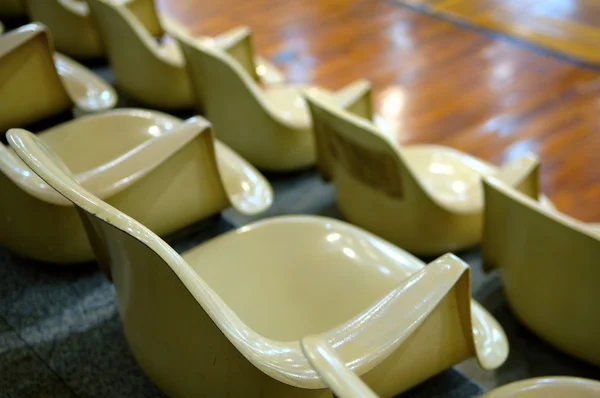 Close-up van lijn van stoelen in stadion — Stockfoto