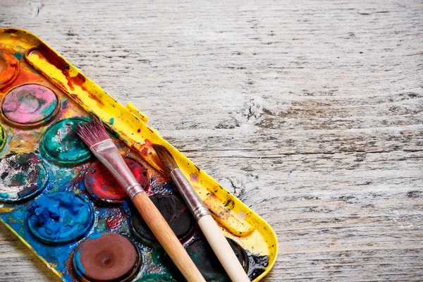 Paint box and paint brush — Stock Photo, Image