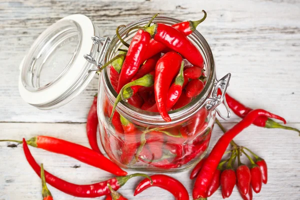 Tarro de vidrio con pimientos — Foto de Stock