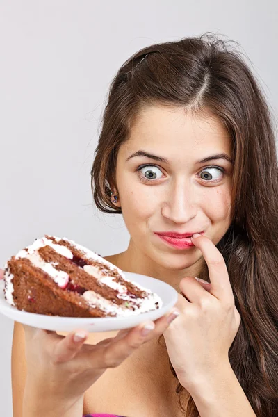 Femme avec un gâteau — Photo