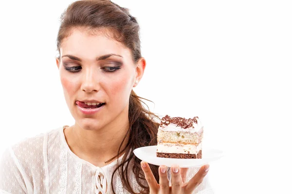 Frau mit einem leckeren Stück Kuchen — Stockfoto