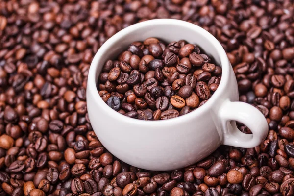 Чашка з кавовими зернами Ліцензійні Стокові Фото