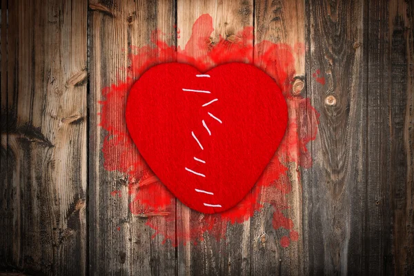 Broken heart stitched together — Stock Photo, Image