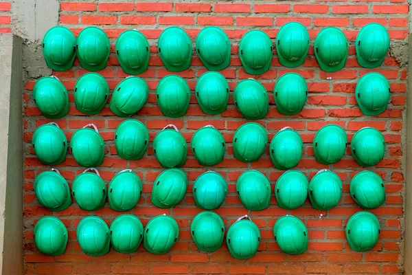 Green construction helmets — Stock Photo, Image