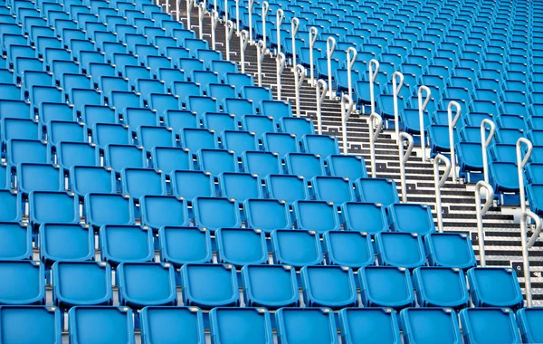 Blauwe stadion zitplaatsen — Stockfoto