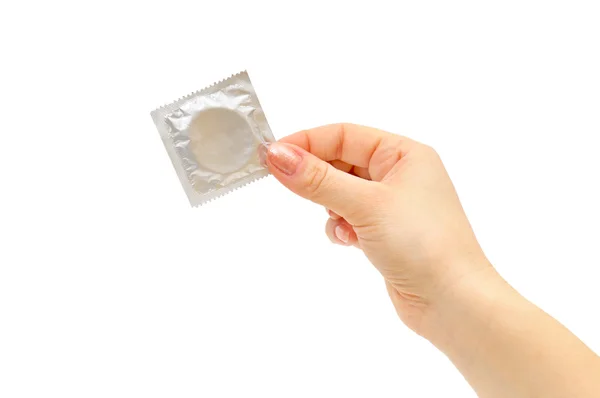 Condom in female hand — Stock Photo, Image