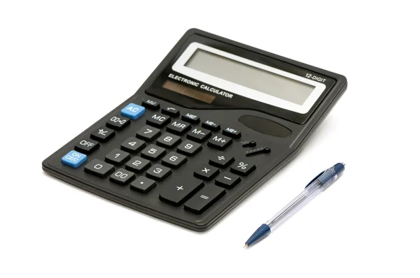 Ручкою та калькулятором — стокове фото