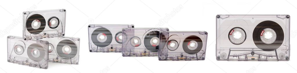 Audio cassette collection isolated on white background. Side view.