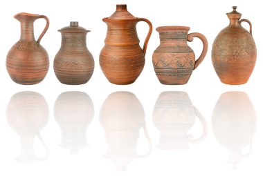 Set ceramic jugs with light reflection isolated on white background