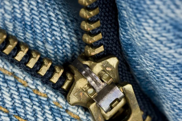 Closeup of zipper in blue jeans — Stock Photo, Image