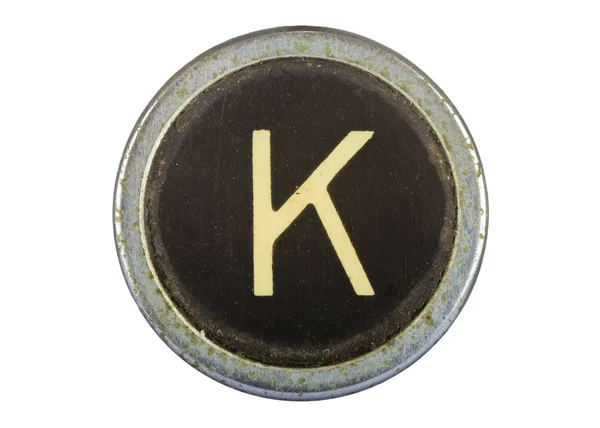 Vintage typewriter letter K isolated on white — Stock Photo, Image