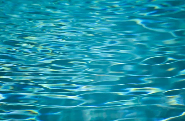 Hotel swimming pool with sunny reflections — Stock Photo, Image