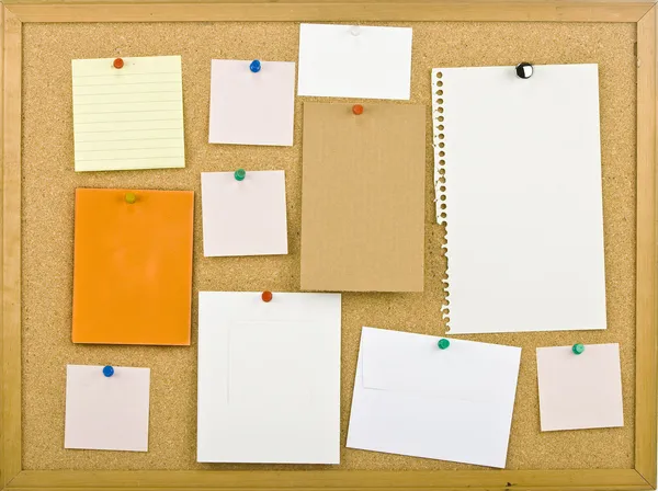 Cork bulletin board with notes — Stock Photo, Image