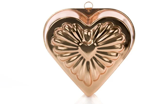 Pendentif en forme de coeur isolé sur blanc — Photo