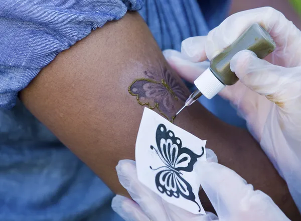 Метелик татуювання — стокове фото