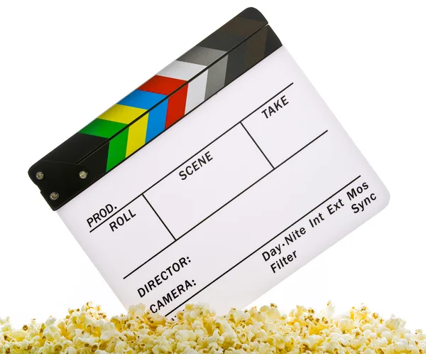 Film Clapper Board en pop-corn avec bobine de film isolé sur blanc — Photo
