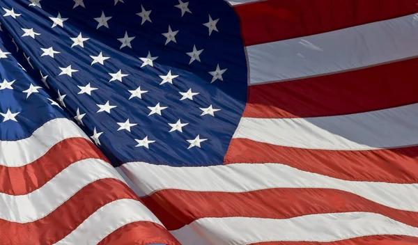 American Flag waving in the wind Stock Photo