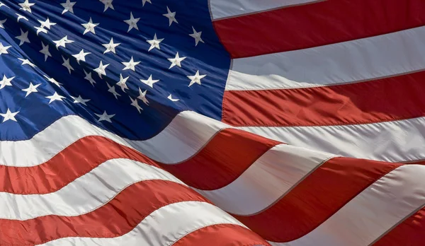 American Flag waving in the wind Stock Photo