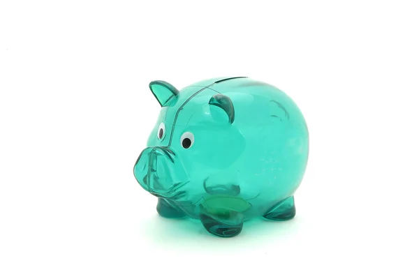 Green transparent piggy bank with few coins isolated on white — Stock Photo, Image