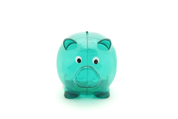 Banco piggy transparente verde com poucas moedas isoladas em branco Fotografias De Stock Royalty-Free