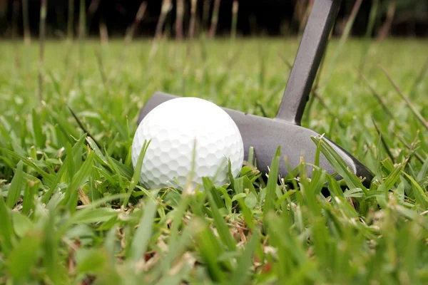 Shot of a golf putter and ball — Stock Photo, Image