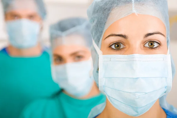 Group of medical doctors with masks — Stock Photo, Image