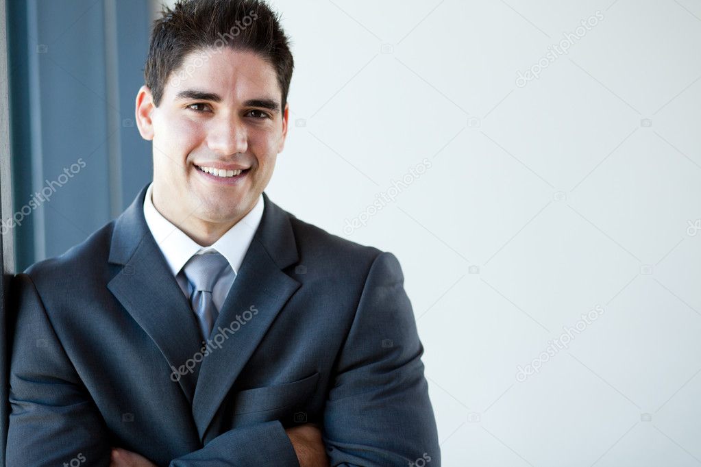 Happy young businessman portrait