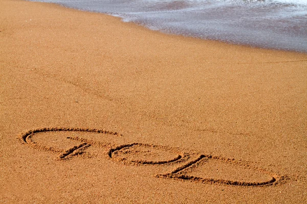 Ordet skrivet på stranden — Stockfoto