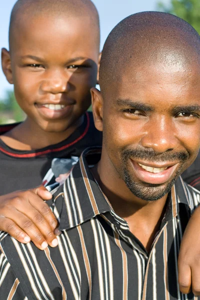 African american father and son outdoors — Stock Photo, Image
