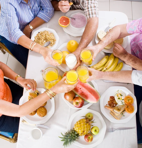 Overhead view of group of having breakfast — Stock Photo, Image