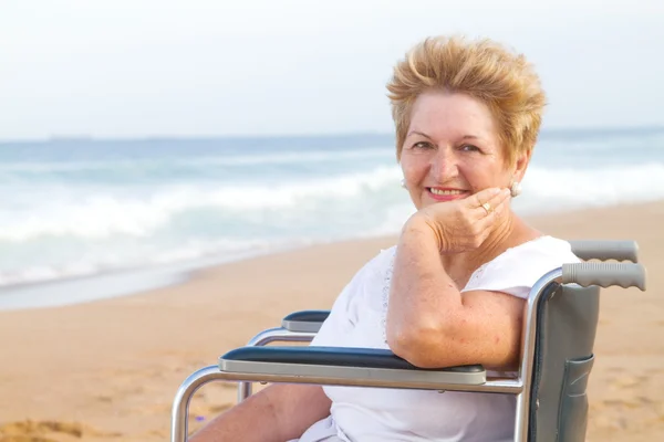 Elderly woman sitting on wheelchair — Stock Photo, Image