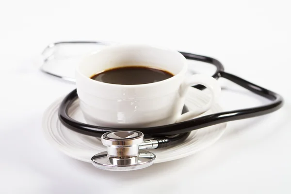 Stetoskop w filiżance kawy — Zdjęcie stockowe