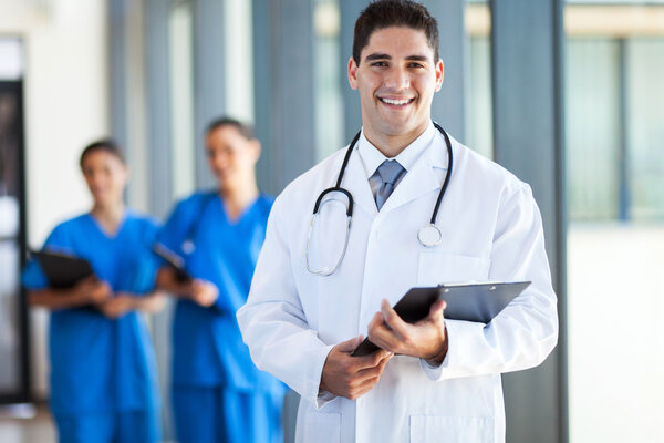 Young medical doctor and staff in hospital