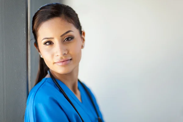 Beautiful female healthcare worker closeup portrait in office — Stock Photo, Image