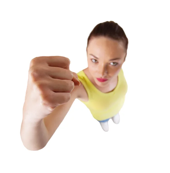 Young woman punching with fist isolated on white — Stock Photo, Image