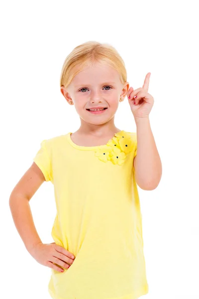 Cute little girl pointing up on white — Stock Photo, Image