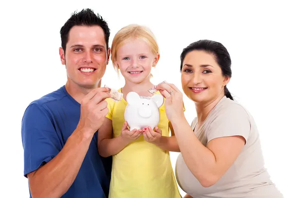 Gelukkig jonge familie opslaan geïsoleerd op wit Stockafbeelding