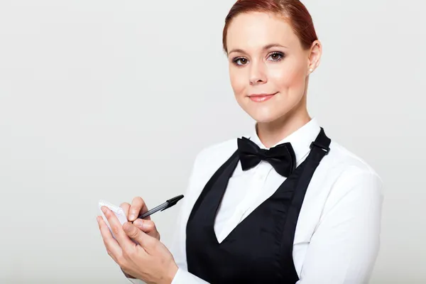 Pretty waitress taking orders isolated — Stock Photo, Image