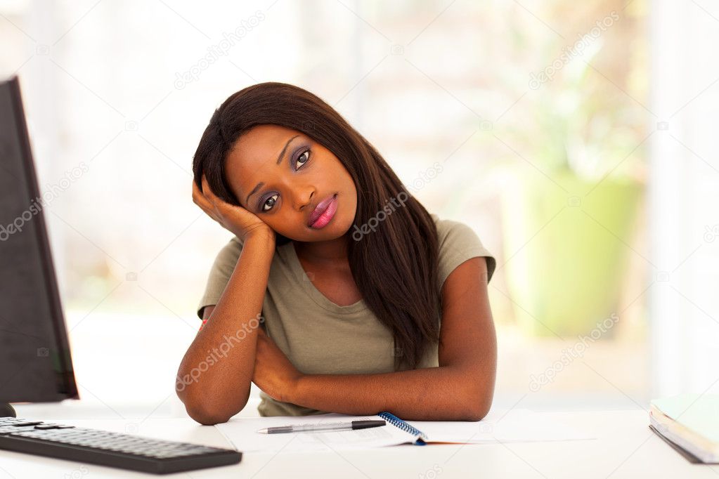 Thoughtful female african american college student portrait