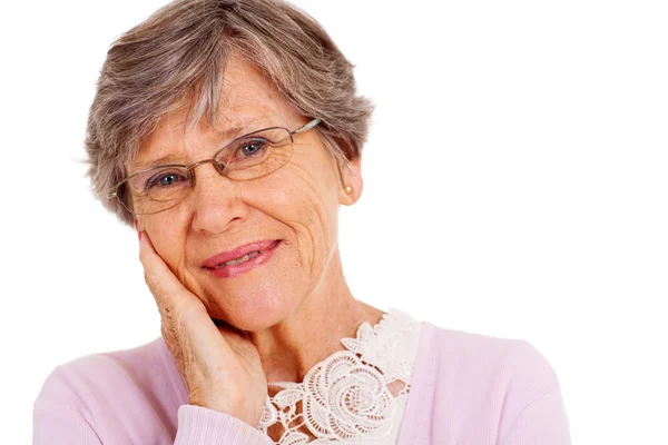 Mujer anciana tiro en la cabeza sobre fondo blanco — Foto de Stock