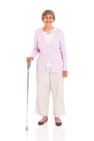 Senior woman with walking cane isolated on white background