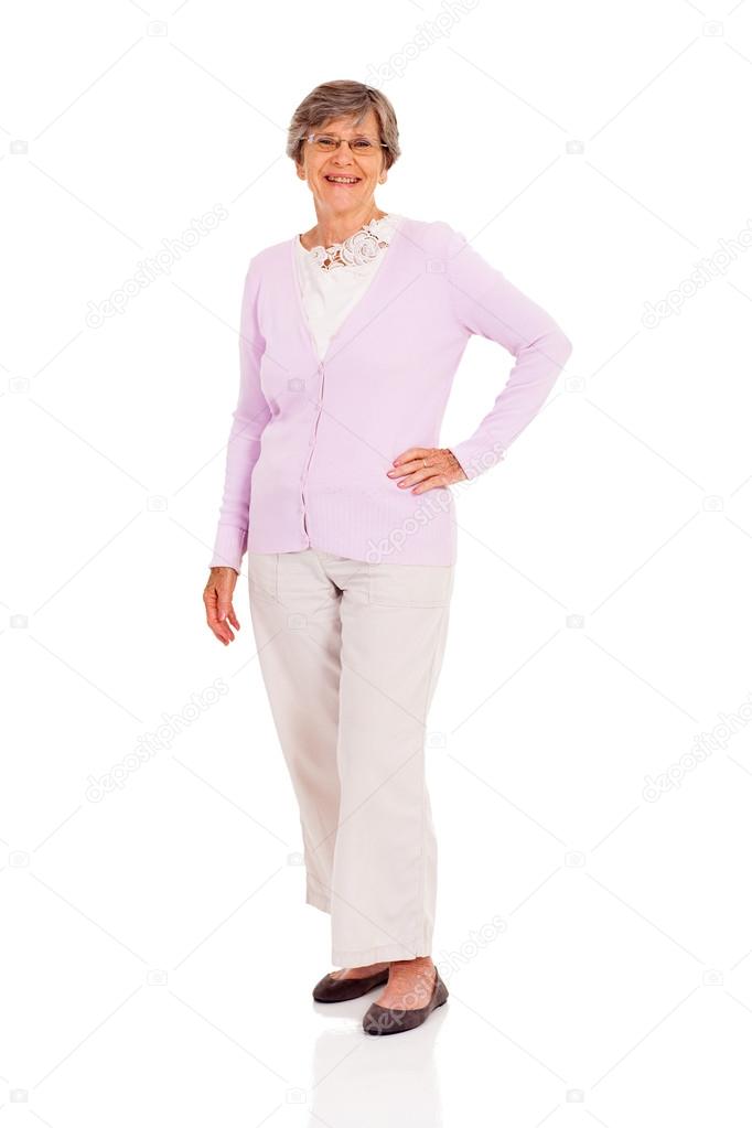 Happy senior woman full length portrait on white