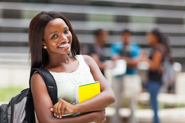 Beautiful young female african college student on campus — Stock Photo, Image