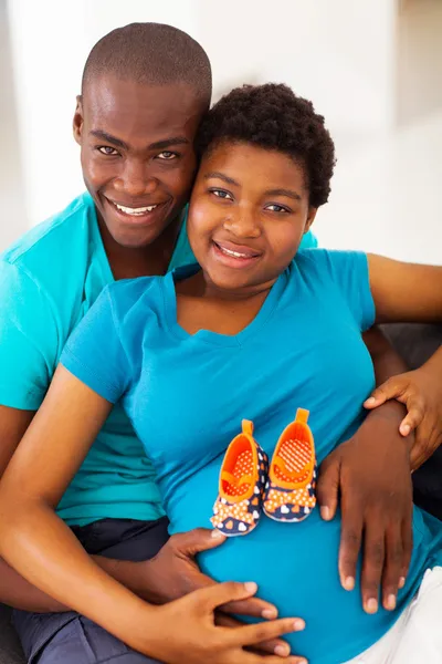 Happy young african american parents to be at home — Stock Photo, Image