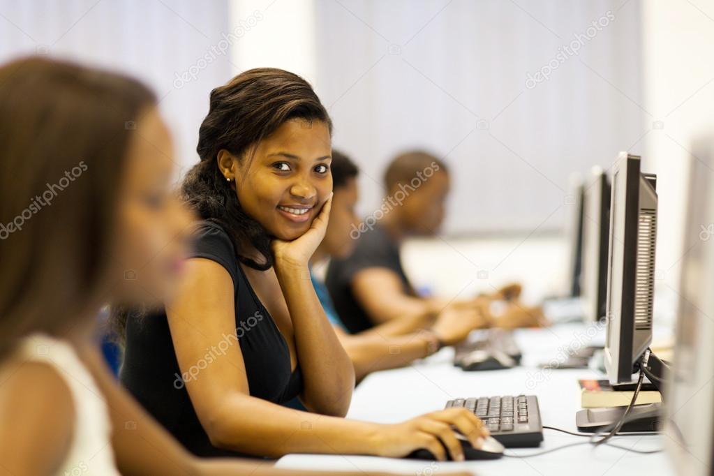group of college students in computer room
