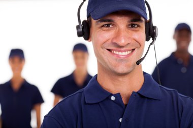 professional technician with headphones on the call