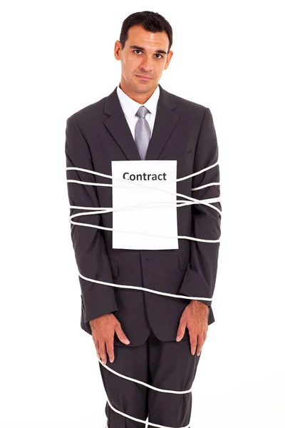 Sad businessman tied with contract isolated on white — Stock Photo, Image