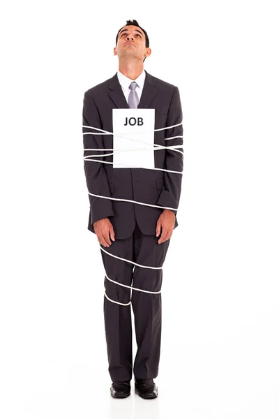 Young man looking for a way out of a boring job — Stock Photo, Image